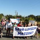 About 350 people marched through Lumsden's streets on Saturday to protest the proposed downgrade...