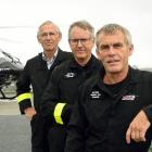 Twenty years on from the inaugural landing, crew (from left) Helicopters Otago chief pilot Graeme...