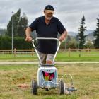 Wanaka A&amp;P Show volunteer Peter Williams, of Oamaru, marks out trade exhibitor sites at...