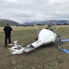 Two people escaped without injury from this helicopter after it crashed at Wanaka Airport...