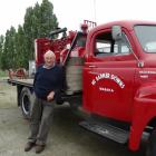 George Wallis stands beside his restored 1950 International truck which was driven to the Wanaka...