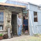 Richard and Jo Flanagan  out the back of the Dunstan Times building, beside a nearly completed...