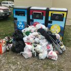 Rubbish that cannot fit into the new BigBelly bins at the Lowburn freedom camping site near...