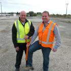 Clutha District Mayor Bryan Cadogan (left) and SouthRoads Ltd construction division manager...