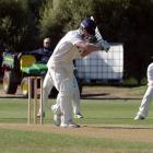 Otago batsman Jimmy Neesham lets a delivery from Canterbury bowler Andrew Ellis go through to...
