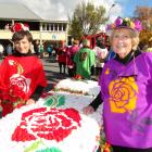 Helen Paterson (left) and Helen Hay display  their bed of roses at the Arrowtown Autumn Festival....