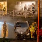 Firefighters put out a fire in a van in Queenstown early yesterday. Photo: James Allan Photography