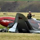 Pilot Arthur Dovey signals he is unscathed. 