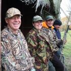 Sharing a joke at the entrance of their mai mai are (from left) Tony Lepper, of Clyde, Brie...
