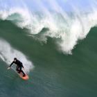 Dunedin surfer Leroy Rust takes on some early season big surf at Kings Rock, Papatowai, in the...