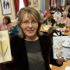 Cathy Fitzsimons teaches budding crafters how to turn books into art at the Regent Theatre on...