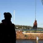 Otago Yacht Club manager Barry Gibbs watches as dredging starts in the Otago Boat Harbour...