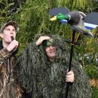 Hunting and Fishing Dunedin employees Riley Bungard (21, left), a self-described "game bird sort...