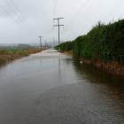 Papakaio Rd in the Waitaki Plains is closed due to flooding. Photo: Hamish MacLean