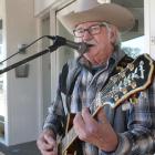 Singing it out ... Alexandra singer Brian Houliston took to Gore's Main St to show the town his...