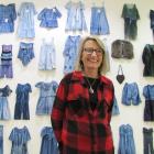 Luggate textile artist Victoria Stevens is flanked by some of the hand-created garments displayed...