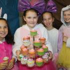 Selling cup cakes are (from left) Isabella Newell (11), Jorja Livingstone-Wood, Zoe Bennetts and...