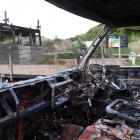 Two trucks were destroyed by fire at Smaills Beach yesterday morning. PHOTO: STEPHEN JAQUIERY

