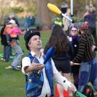 Dunedin Fire and Circus Club president Miguel Nitis demonstrates his juggling skills at the...