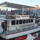 Perky's Bar at its Queenstown Bay mooring. Photo: Guy Williams