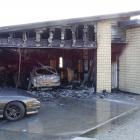 A car, garage and part of a residential property in Lake Hayes Estate, between Arrowtown and...