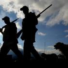 On the first day of this year's duck-shooting season, hunters Jared Lusty of Taieri (left) and...