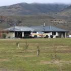 A house near Cromwell was nearly destroyed by fire early on Saturday morning. Photo: Tom Kitchin