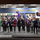 Striking nurses form a picket line in front of Dunedin Hospital on Thursday morning. Photo:...