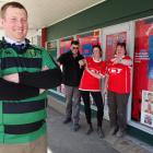 Maheno rugby player and Kurow resident Andrew Fisher is goaded by Kurow supporters (from left)...