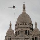 Tatiana-Mosio Bongonga advances on a tightrope as she scales the Monmartre hill towards the Sacre...