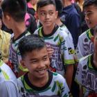 The 'Wild Boars' soccer team arrive for a press conference for the first time since they were...