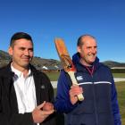 Dunedin City Council parks maintenance team leader Nick Maguire (left) and Taieri Cricket Club...