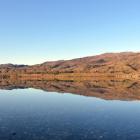 Lake Dunstan, formed after completion of the Clyde dam, owned by Contact Energy. The lake began...