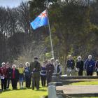 New Zealand Army Sergeant Lloyd Leitch speaks at a graveside service at the Otokia Cemetery  on ...