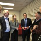 National's agriculture spokesman Nathan Guy (centre) and Invercargill MP Sarah Dowie, talk with...