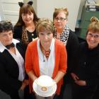 Norma McLeod (centre) surrounded by her colleagues on her last day of work at the Oamaru division...