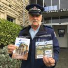 Senior Constable Bruce Dow, of Oamaru, with examples of correspondence that has been sent to...