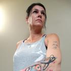 Oamaru’s Mel Rushton shows off her  tattoo of an owl at the Tattooed &amp; Proud show at the...