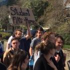 Hundreds gathered at the University to Otago to protest and present a petition to the proctor...