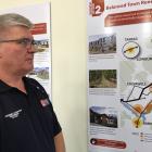 Cromwell Community Board chairman Neil Gillespie looks over one of the options for residential...