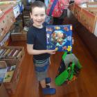 Karitane boy Jake Norgrave-Thorley (5) was delighted with his book at the Karitane school  book...