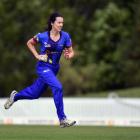 Otago Sparks Australian import Lisa Griffith runs in to bowl against the Central Hinds during...