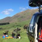 Crew from the Otago Regional Rescue Helicopter attend an incident involving a parapenter...