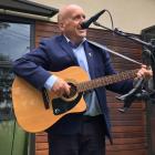 Central Otago Mayor Tim Cadogan sings the opening number at the inaugural Alexandra Buskers...