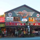 The old-fashioned decor and motoring memorabilia draw visitors to Rick’s Garage, in Palmwoods,...