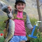 Pippa Craigie with her brown trout. Photo: Anita Holthaus