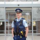 Probationary constable Scott Turner outside the Dunedin Police Station yesterday.PHOTO: LINDA...