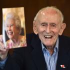 Mosgiel resident Gerald Huntley with a birthday card from the Queen. PHOTO: PETER MCINTOSH
