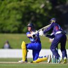 Otago Volts all-rounder Nathan Smith plays a sweep shot during his innings of 43 in the Shell...