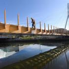 Water of Leith bridge project manager Walter Reikes, of Edifice construction, works on decking...